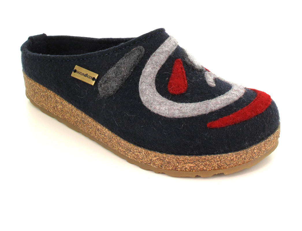 Haflinger Grizzly open-back slippers with 100% wool felt uppers in blue with red and grey shapes.
